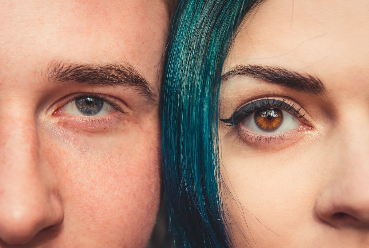 man and woman taking selfie